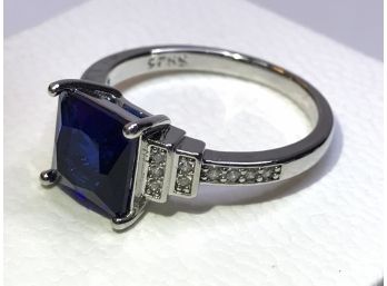 Wonderful Sterling Silver / 925 Ring With Deep Sapphire Blue Color Stone Flanked By White Topaz Stones