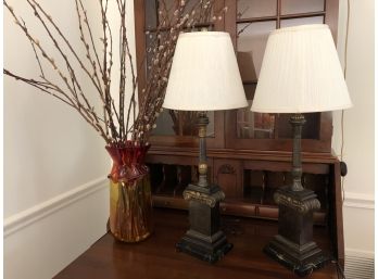 A Pair Of Empire Style Metal Lamps Set On Marble And Amber/orange Oversized Vase