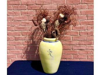 A Large Yellow Ceramic Vase With 2 Dried Floral Arrangement