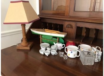 Model Sailboat, Crystal Bank, Tiny Tea Set And Wooden Lamp