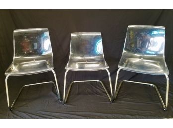 Three Ikea Tobias Lucite Chairs