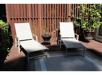 Pair Of Outdoor Loungers And Wicker Accent Table