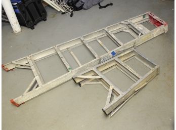 A Pairing Of Aluminum A Frame Ladders