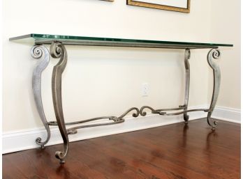 A Whimsical Polished Alloy And Glass Console Table