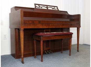 A Vintage Wurlitzer Console Upright Piano