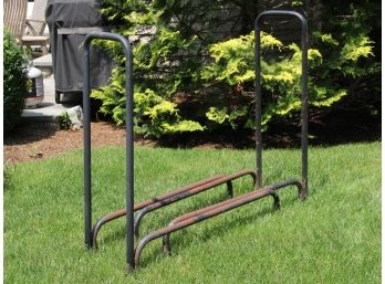 An 8' Tubular Steel Wood Rack