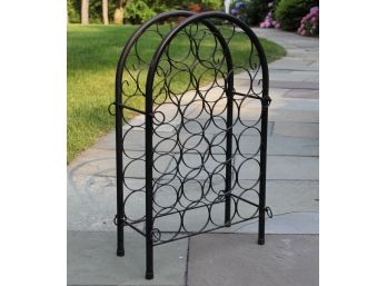 A Vintage Wrought Iron 22 Bottle Standing Wine Rack