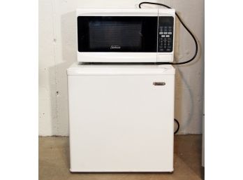 A Bar Fridge And Microwave