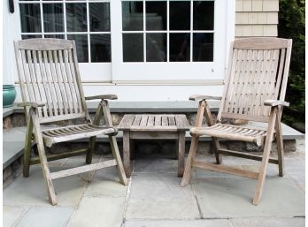 A Pair Of Outdoor Teak Folding Arm Chair And Cocktail Table