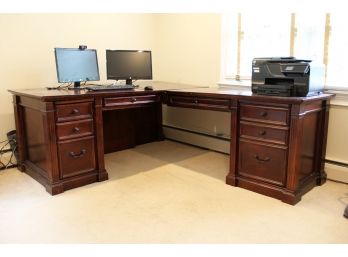 A Large Mahogany 'L' Shape Sectional Desk