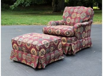 An Upholstered Armchair And Ottoman By Sherill Furniture