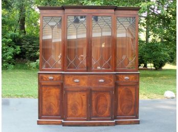 An Antique English Setback China Cabinet