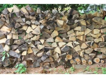 A Large Lot Of Firewood, And One 8' Wood Rack