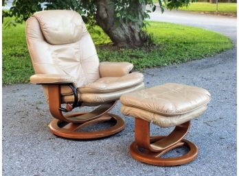 A Palliser Leather Recliner And Ottoman