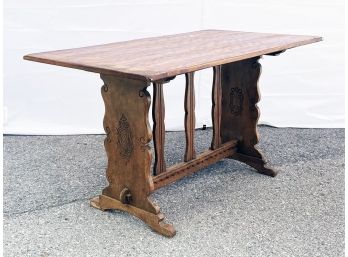 A 19th Century Tiger Maple Trestle Table