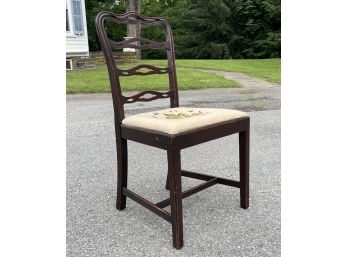 A Vintage Ladder Back Side Chair With Needlepoint Seat