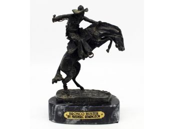 A Vintage Frederick Remington Bronze 'Bronco Buster'