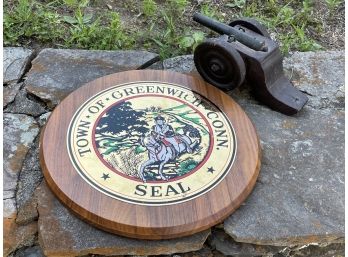 The Seal Of The Town Of Greenwich, And An Antique Cast Iron Toy Cannon