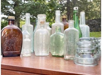 A Large Collection Of Antique And Vintage Bottles And Glass Insulators