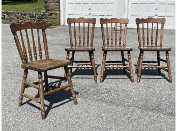 A Set Of 4 Vintage Pine Spindle Back Dining Chairs