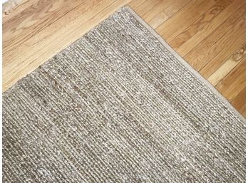 A Modern Natural Chenille Rug By Pottery Barn