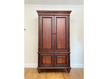 A Paneled Wood Wardrobe Cabinet By Pottery Barn