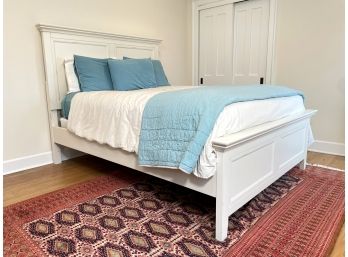 A Paneled White Painted Wood Queen Size Bedstead And Bedding By Pottery Barn