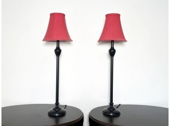 A Pair Of Bronze Tone Stick Lamps