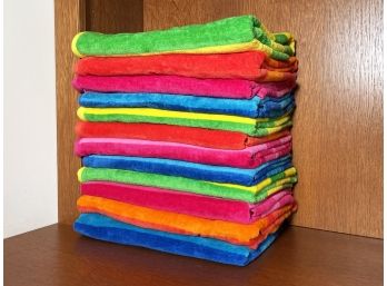 A Set Of 12 Colorful Pool Or Beach Towels