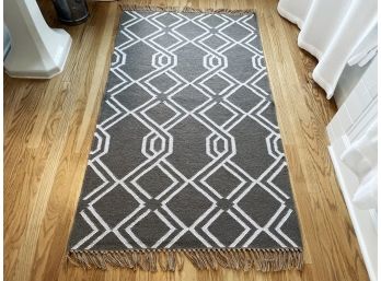 A Modern Geometric Area Rug By Pottery Barn