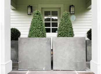 A Pair Of Large Modern Brutalist Cast Planters With Faux Foliage