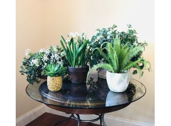 Grouping Of Faux Foliage In Pots