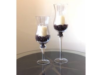 PAIR OF TALL FINE GLASS CANDLE HOLDERS WITH RED STONES