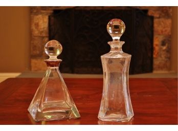 Two Crystal Decanters With Toppers