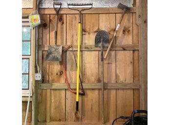 Wall Of Tools: 2 Shovels, Rake, Bow Saw, And Maul