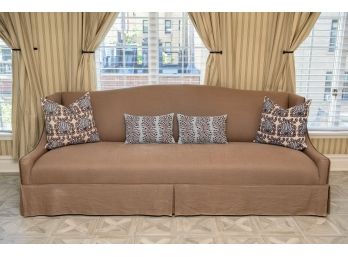 Custom Skirted Sofa With Nailhead Trim And Complimenting John Robshaw Pillows