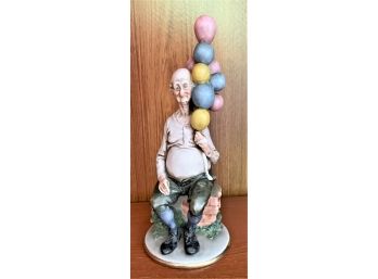 Capodimonte Porcelain Figure Of A Old Man With Balloons