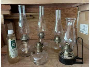 Group Of Five Clear Glass Oil Lamps