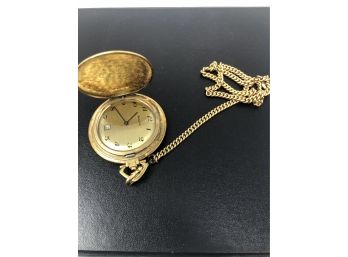 A Monogrammed Gold Tone Bulova Pocket Watch