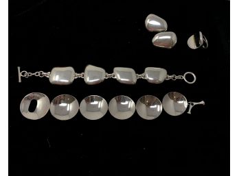 2 Chunky Sterling Bracelets, A Pair Of Sterling Earrings And A RLM Studio Ring - 3.414 Oz