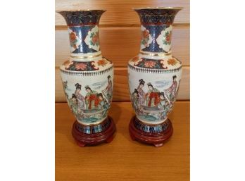 Chinese Ceramic Painted & Gilted Vase Pair With Carved Wooden Bases