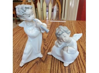 Two Lladro Angle Children Hand- Made In Spain. The One Playing The Flute Is No 4540