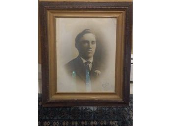 Black And White Portrait Picture Of A Young Man In Carved Wooden Frame