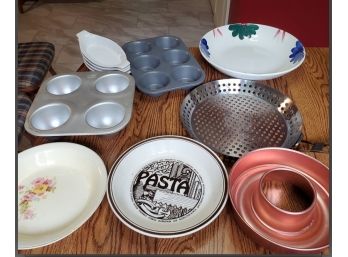 Assorted Kitchen Cooking Pans And Serving Bowls