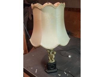 Lamp With Metal Base And Intricate Cherub Theme