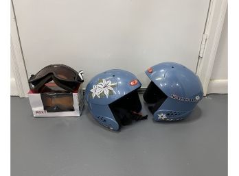 Two Salomon Ski Helmets And Two Pairs Of Goggles