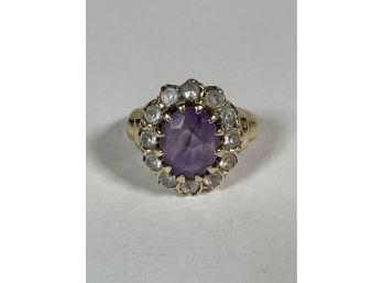 A 14K GOLD RING WITH AMETHYST AND DIAMONDS. 5 GRAMS