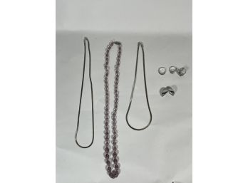 3 STERLING RINGS 2 STERLING NECKLACES AND A AMETHYST NECKLACE