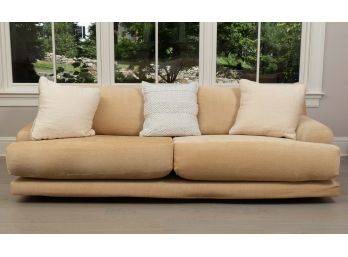 Beige Modernist Couch With Throw Pillows