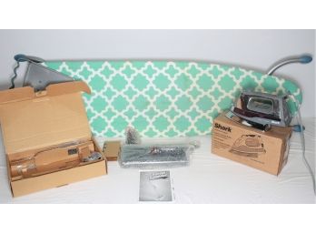 Ironing Board With Two Irons And Swiffer Sweeper